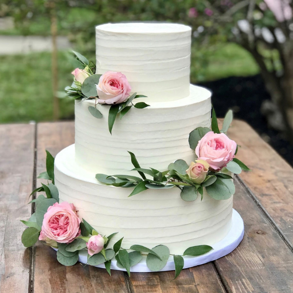 Two Tier Pink Shaded Swirls Cake With Fresh Flowers (Eggless) - Ovenfresh